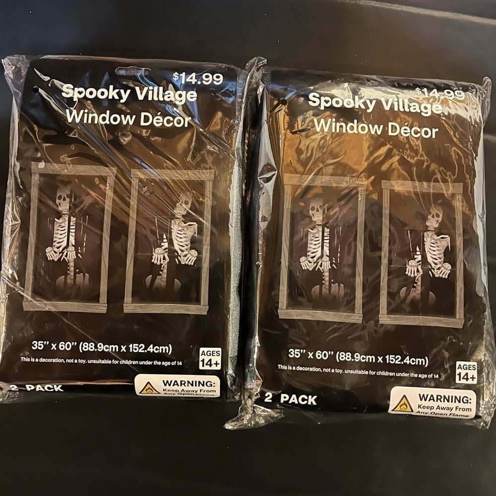 Spooky Village Window Decor 2 Packs of 2 (4Total) Size 35” x 60”. Skeletons. NWT